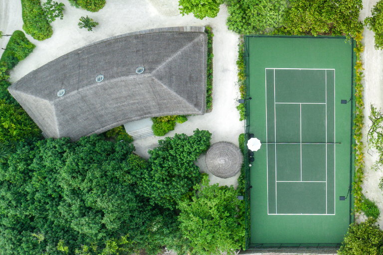 Fairmont Maldives Sirru Fen Fushi Tennis Court aerial