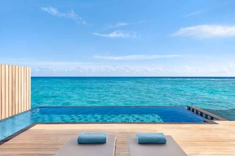 Hilton Maldives Amingiri Resort & Spa One Bedroom Overwater Pool Villa sundeck and pool