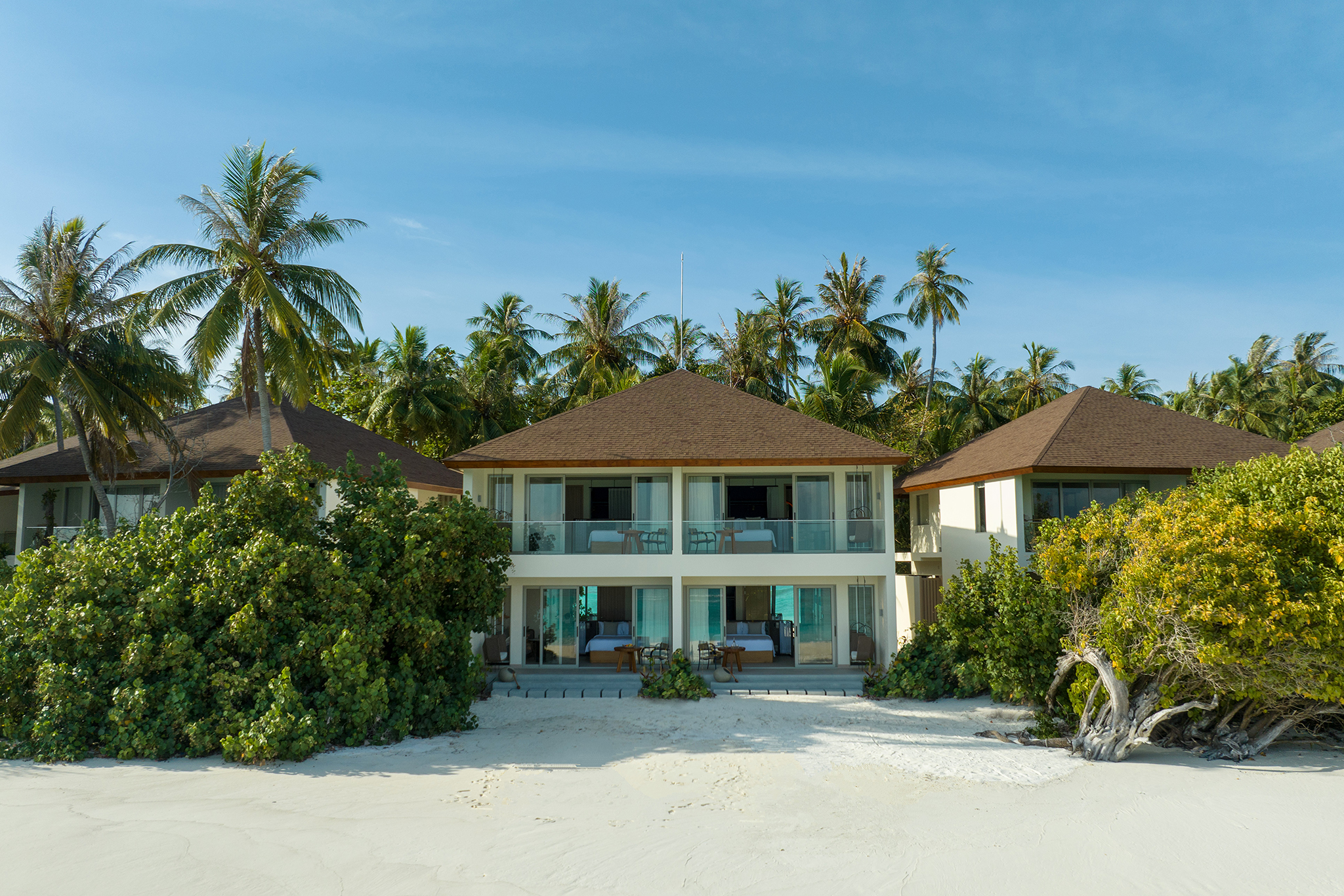 Avani + Fares Sunset Overwater Pool Villa Bedroom