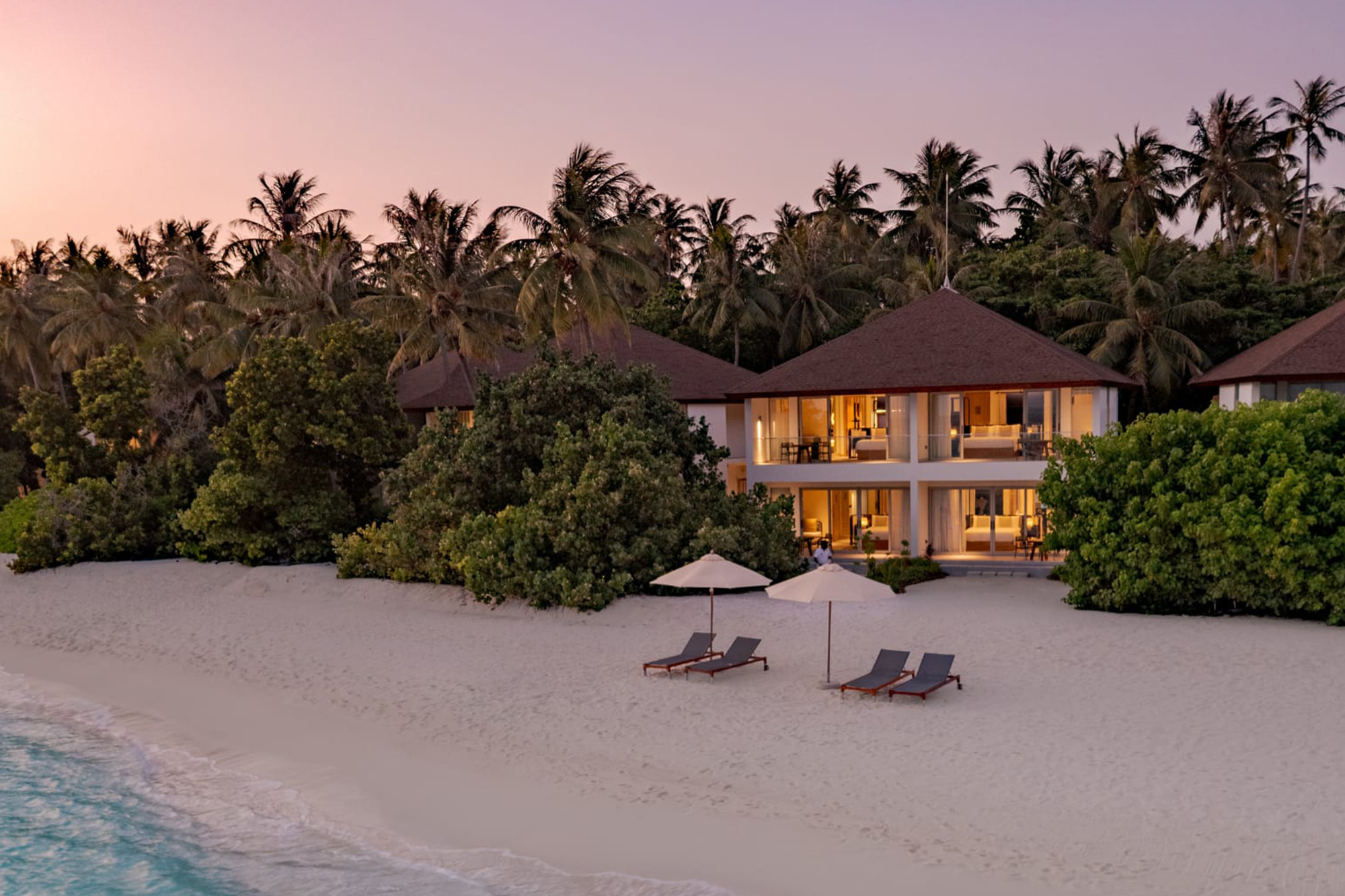 Avani-Fares-Maldives-- Beachside-pavilions-sunset