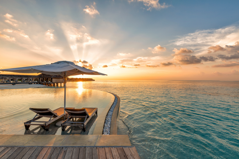 Hurawalhi Island Resort Maldives Pool view sunset