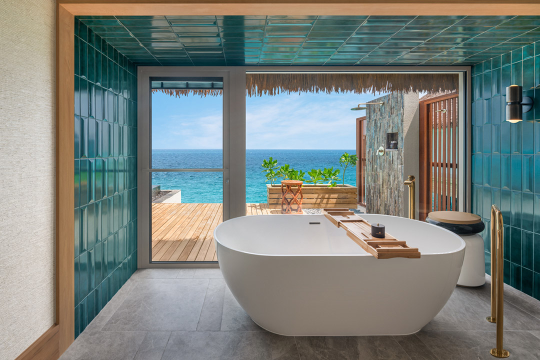JW Marriott Maldives Kaafu Atoll Island Resort interior view of a overwater pool villa with a private outdoor pool on its sun deck and with ocean views